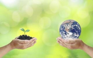 exchange-of-planets-in-the-hands-of-humans-with-young-plants-in-the-hands-of-humans-the-concept-of-earth-day-and-conservation-of-the-environment-elements-of-this-image-decorated-by-nasa-free-photo
